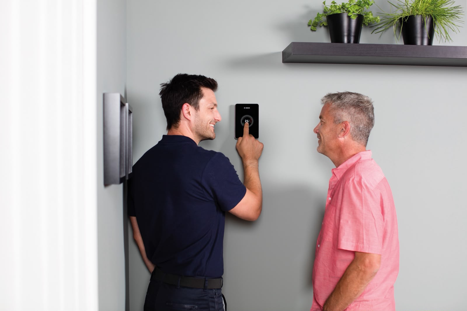 Vesta Heating engineer with smart thermostat